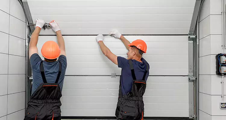 Garage Door Bottom Panel Repair in University, FL